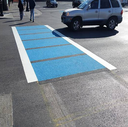 blue crosswalk stormwater workers